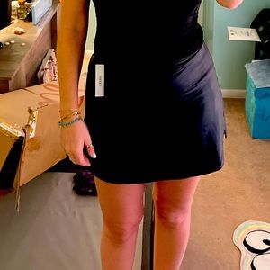 Sheer blk skort with shorts/pockets. Size large. Perfect for outdoor activities!